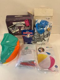 Beach Balls, Dolphin Sprinkler, And Family Travel Kit