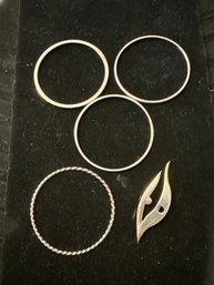 Silver Bangles And Newbridge Pin