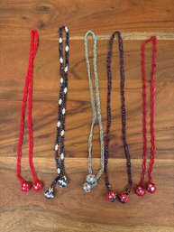 Vintage Glass Bead Necklaces With Spherical Pendants And Geometric Patterns