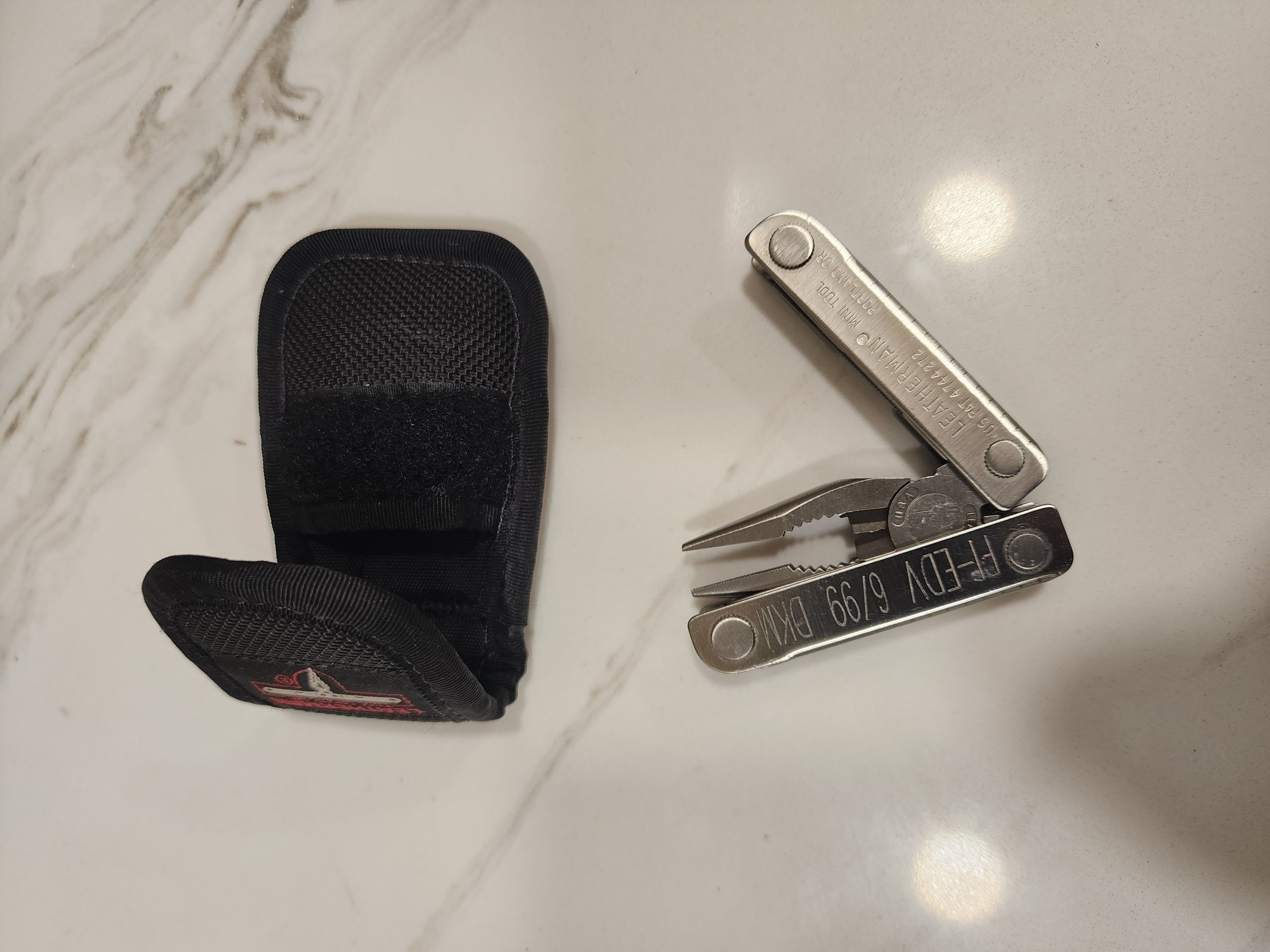 80 LEATHERMAN MINI TOOL 6598