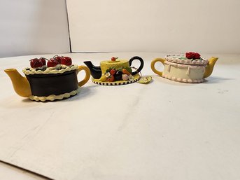 #113  Lot Of 3 Mini Cake Shaped Teapots
