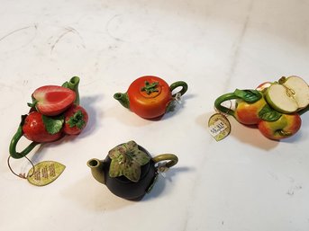 #114  Lot Of 4 Mini Collectable Teapots