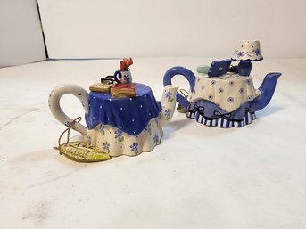 #114  2 Mini Blue And White Collector Teapots