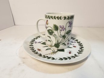 #147 BOTANICAL TEACUP AND SAUCER.