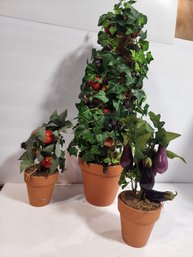 #73 TOPIARY SET WITH CLAY VEGGIES ON IT