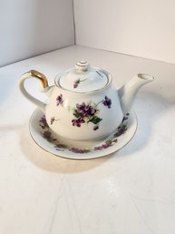 #112 PURPLE TEAPOT AND SAUCER