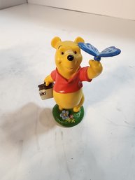 #133 WINNIE THE POOH FIGURINE