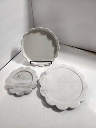 #6 2 MARBLE TRIVETS AND A BAKING DISH