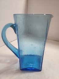 #40  Beautiful Vintage Blue Glass Pitcher.