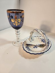 #134 HAND PAINTED PURPLE GLASS AND BLUE AND WHITE DISH WITH SPOON
