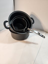 #140 4 IRON COOKING POTS