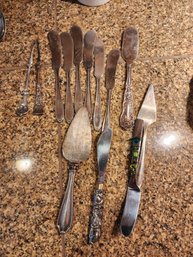 #240 Lot Of Butter Knives And Picks