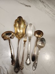 #12 ASSORTED STERLING SILVER SERVING UTENSILS 193.61GR.