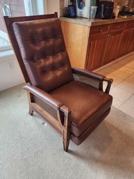 #18 VINTAGE LEATHER RECLINER WITH WICKER SIDES. SUPER COMFORTABLE AND STYLISH