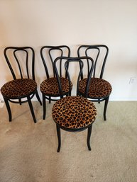 #20  SET OF 4 VINTAGE BENTWOOD CHAIRS WITH LEOPARD PRINT SEATS.