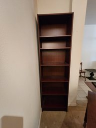 #106 TALL BOOKCASE 24X11X79