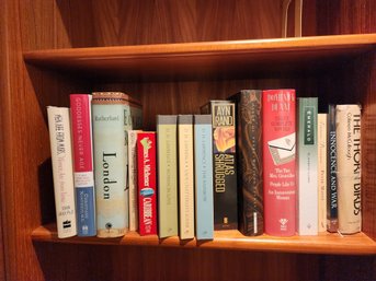 #128 LOT 2 OF NEWER HARD BACK BOOKS