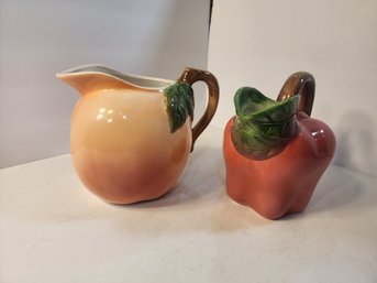 #17 2 Fruit Pitchers Peach And Plum, The Peach Has An Unfortunate Resemblance To A .......