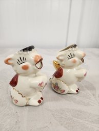 #16?  PAIR OF VINTAGE  COW CREAMERS