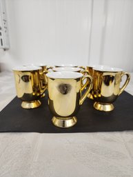 #115 7 GOLD COFFEE MUGS