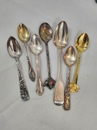 #90 7  COLLECTOR SPOONS WITH UNKNOWN MARKINGS