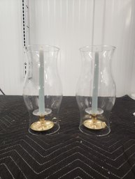 138   PAIR OF VINTAGE GLASS AND BRASS CANDLE HOLDERS WITH TAPERS