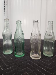 #147 ANTIQUE SODA BOTTLES