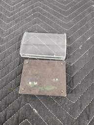 #151 ANTIQUE GLASS MAGNIFIER AND METAL COIN BOX