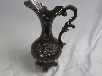 #22 BRASS FOOTED ITAILIAN FLORAL DESIGN PITCHER FOOTED