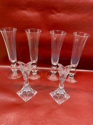 Flute Glasses And Candle Sticks