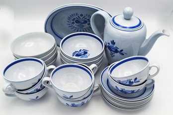 A Large Set Of Arabia Blue Rose Ceramic Dinnerware
