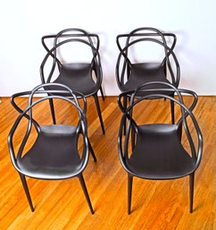 Four Black Kartell Masters Chairs By Philippe Starck