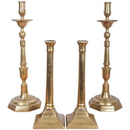 Two Pairs Of Antique Brass Candlesticks