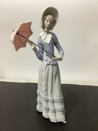 Lladro  Titled 'Aranjuez Little Lady,'