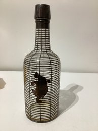 Glass Liquor Bottle With An  Overlay Cage Pattern