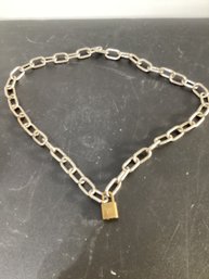 Silver Chain With A Louie Vuitton Lock