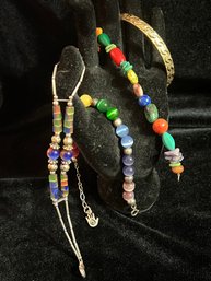 Three Beaded Bracelets And One Gold Tone Bangle Monet