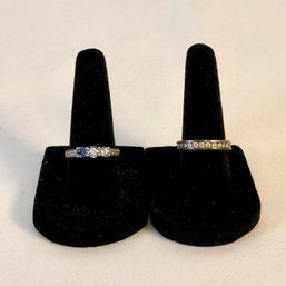 Pair Of Sterling Silver Bands With Cubic Zirconia And Tanzanite Stones Estimated Size 7