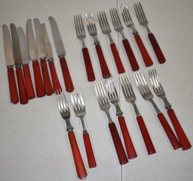 (2) RED BAKELITE HANDLED FLATWARE PIECES