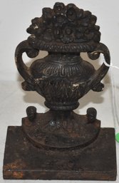5 1/2' CAST IRON URN FLOWERS DOORSTOP