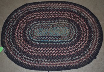 SM. OVAL HAND BRAIDED RUG