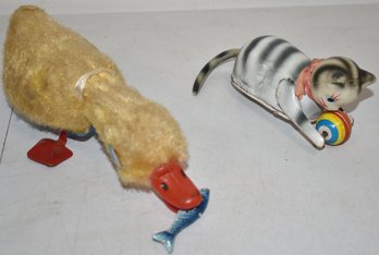 (2) VINTAGE WIND UP TOYS