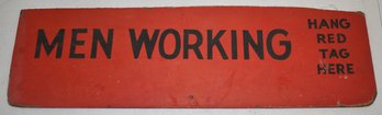 MEN WORKING SIGN