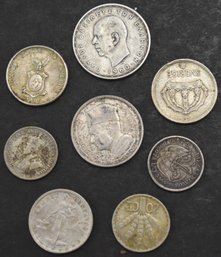 (8) MISC FOREIGN SILVER COINS