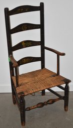 EARLY PAINT DECORATED LADDERBACK ARM CHAIR