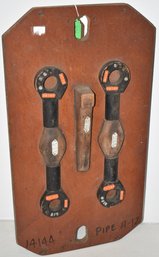 WOODEN PLAQUE W/ INDUSTRIAL FOUNDRY MOLDS