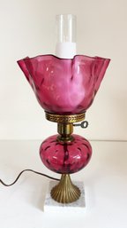 Vintage Cranberry Art Glass Electrified Parlor Lamp With Marble Base That Was Made In Italy