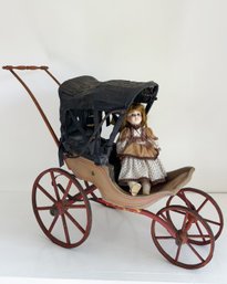 Antique 19th-century Wooden Victorian Doll Carriage. Stenciled Wooden Wheels And A Black Canopy  Doll Included