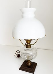 Antique Oil Lamp Electrified, With Milk Glass Shade And Clear Pressed Glass Base. 19 Inches Tall