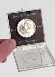 1964 United States Kennedy Half Dollar Housed In A Black/clear Commemorative Plastic Display. 35th President